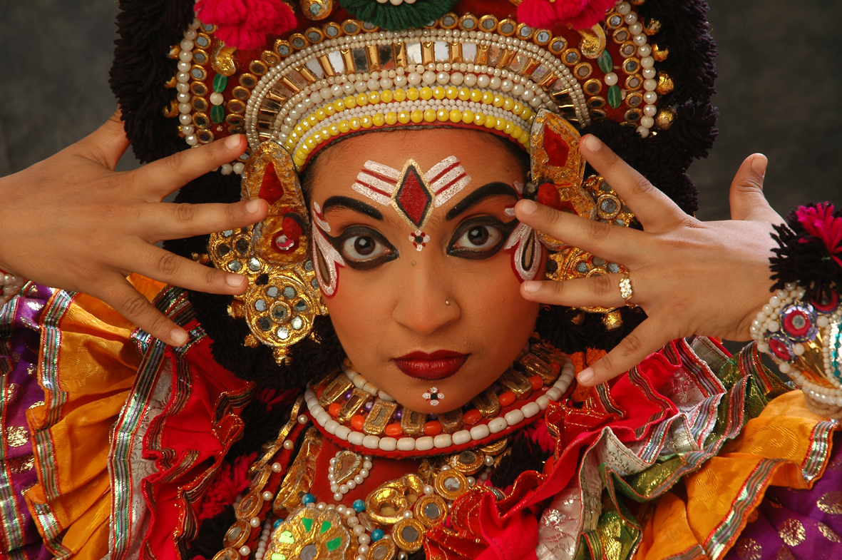 South Asian full costume and face painted dancer