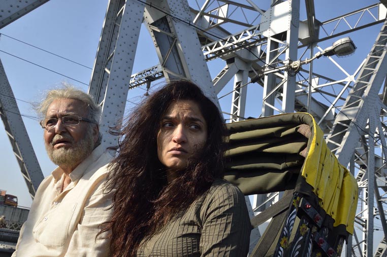 BEDLAM bridge image of an older man and young woman in a carriage looking melancholic