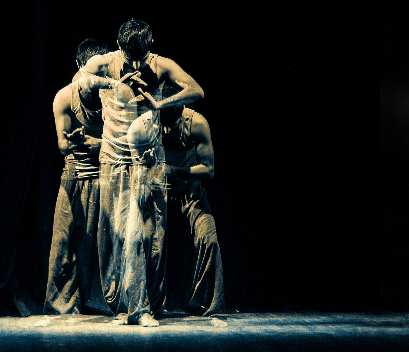 Layered image of Subhash Viman movement poses in monochromatic scale