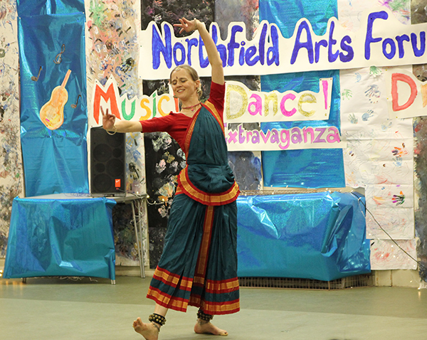 Arts Champion 2015, a female dancer in the middle of a room decorated for the midland's arts festival mid dance