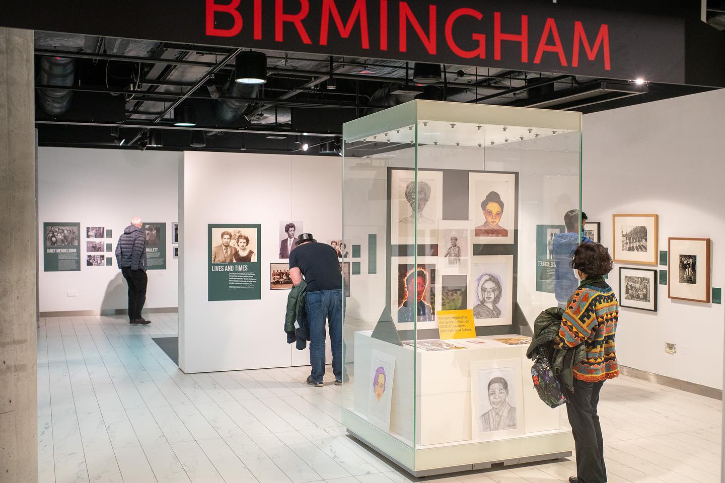 Members of the public in the exhibition space