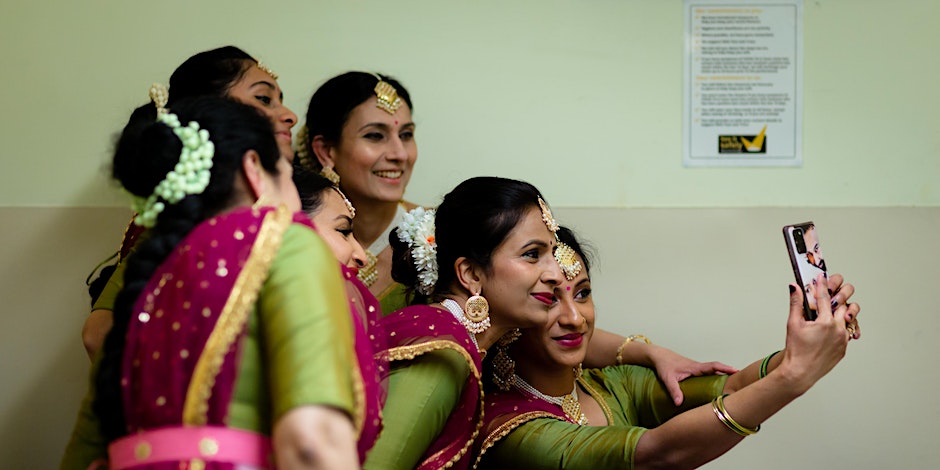 dancers backstage taking a selfie
