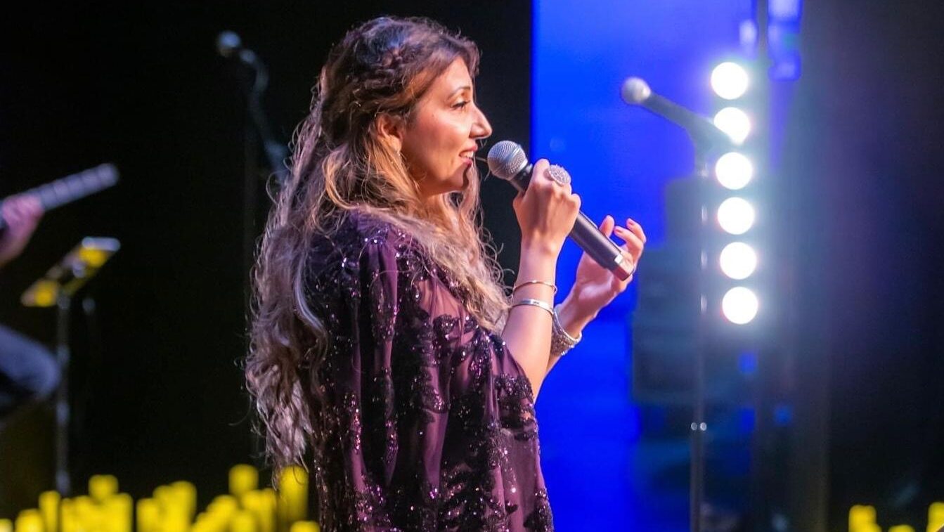 a female vocalist singing