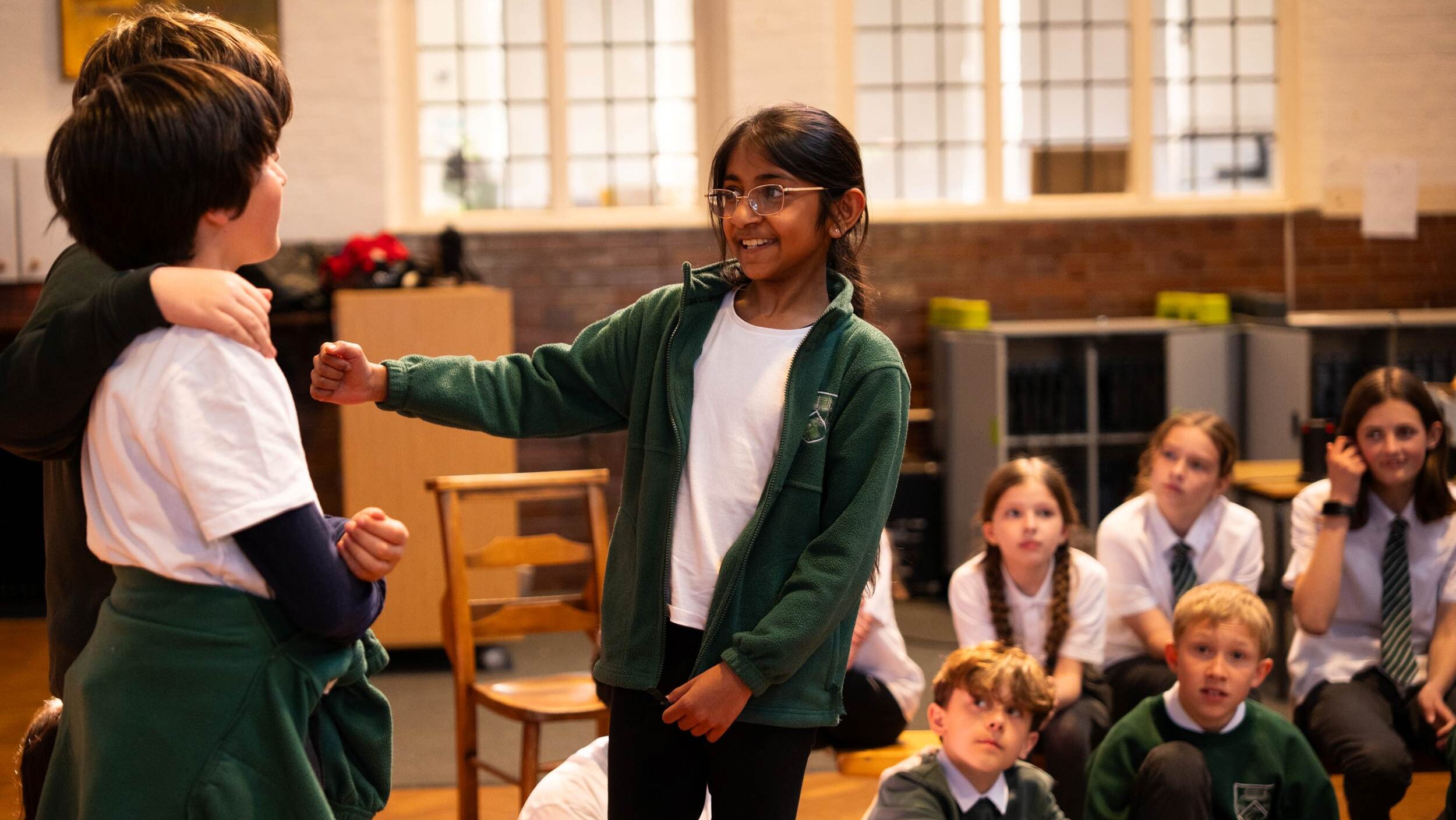 children at school participating in workshop