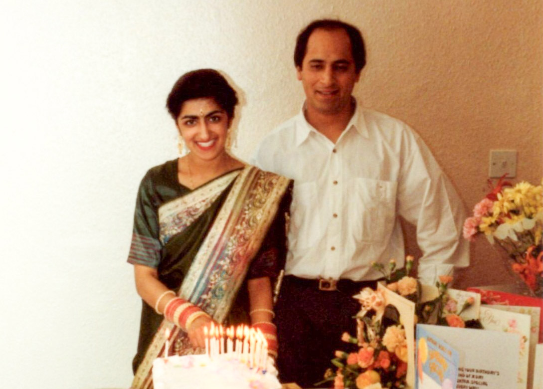 Sari Stories exhibition. Couple cutting a birthday cake