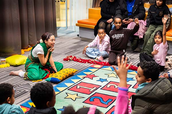 Lori storytelling to children